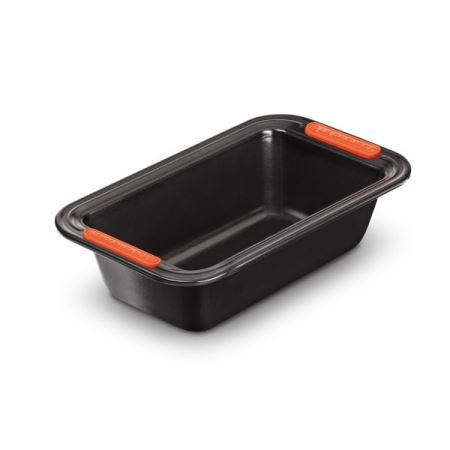 Can the Le Creuset Toughened Non-stick 2lb Loaf Tin be used in the dishwasher or microwave?