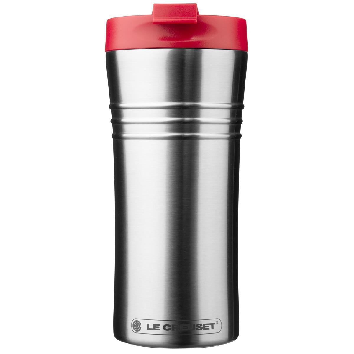 What are the characteristics of the Le Creuset travel mug made of stainless steel?