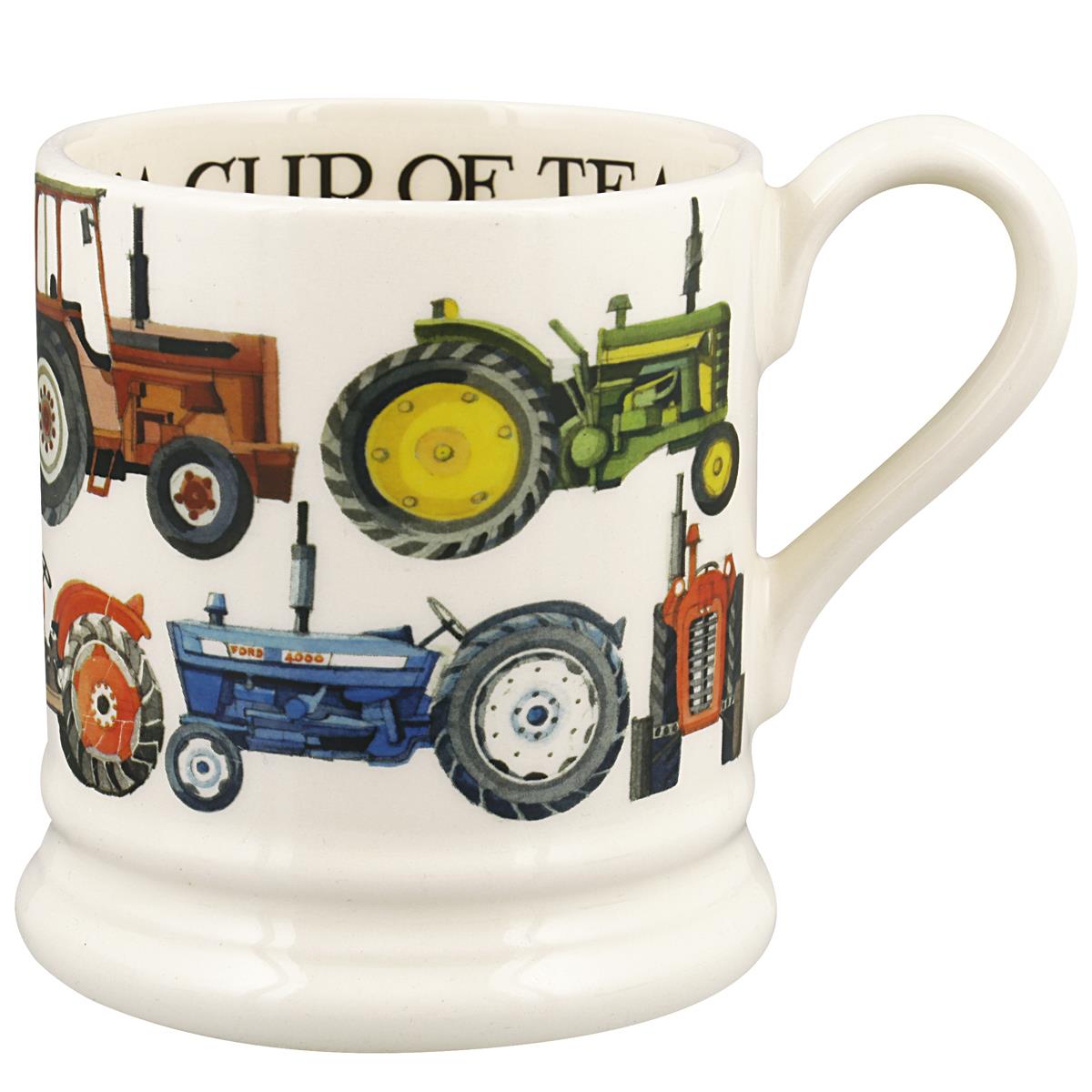 What is written inside the top of the emma bridgewater tractor mug?