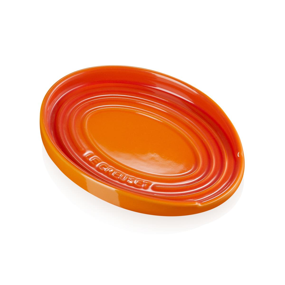 How is the le creuset spoon rest utilized with the Le Creuset Stoneware Oval Spoon Rest?